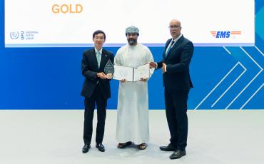 EMS Oman receiving their Gold performance award